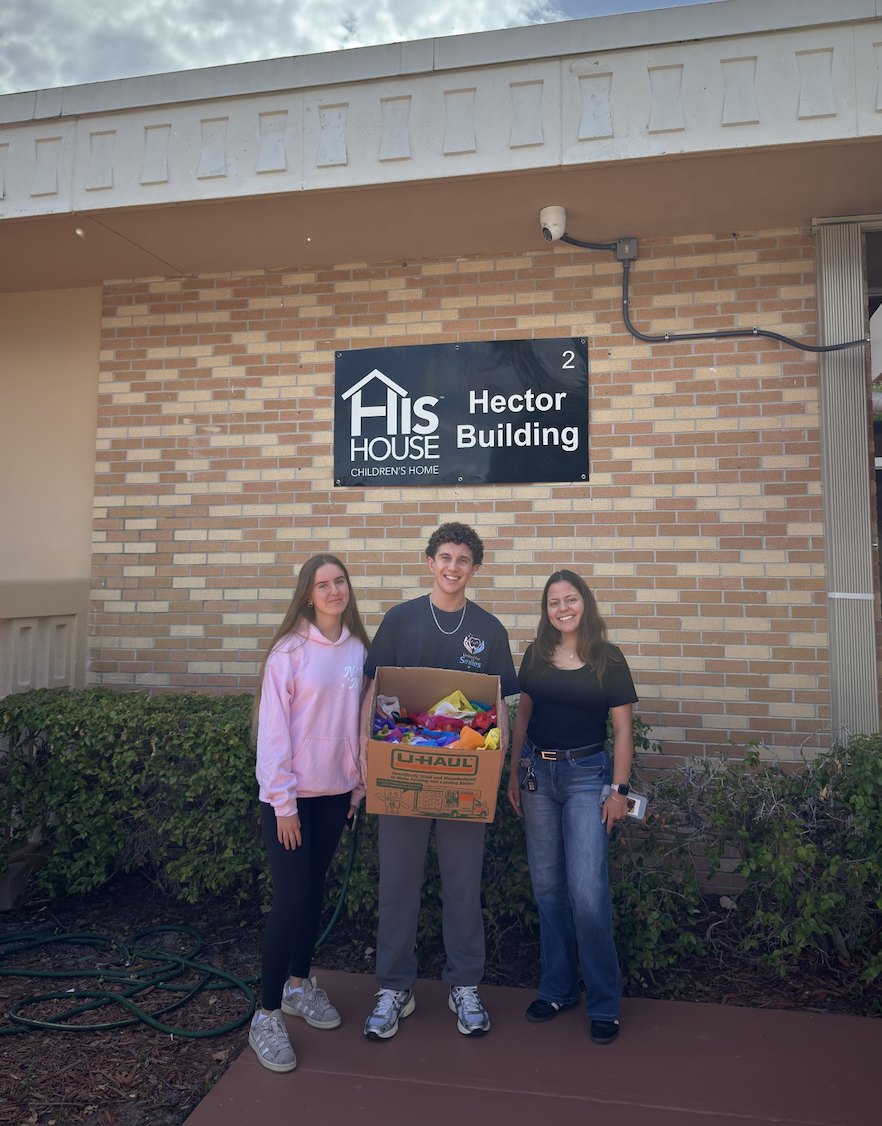 United for Smiles volunteers delivering kits